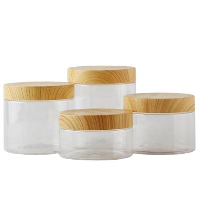 China Plastic Skin Care Cream Skin Care PET Cream Jar With Wood Grain Plastic Cap for sale