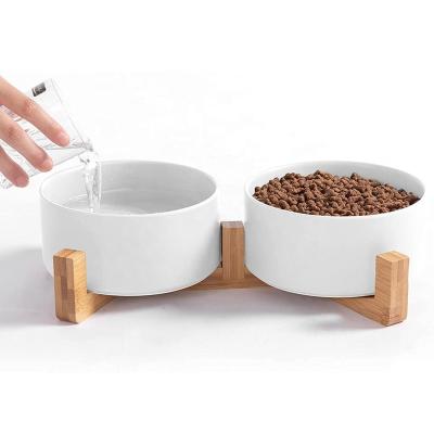 China Stocked Raised Dog Food Water Bowl Set Ceramic Puppy Dog Bowl With Wooden Stand Non-Slip White Pet Bowls Dog And Cat for sale