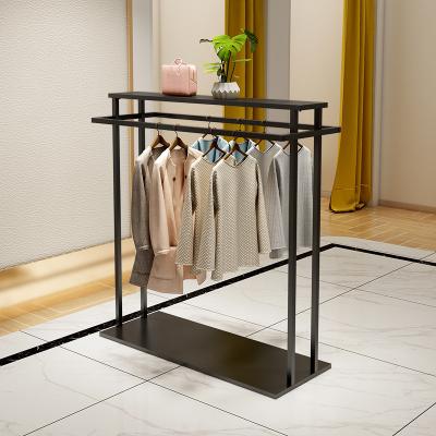 China Beautiful Metal Clothing Retail Store Interior Design Garment Shop Furniture Display Hanger Women Clothing Rack for sale