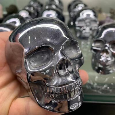 China China Wholesale Hematite Skull Hertz Titanium Skulls Crystal Engraving Crystal Crafts For Gifts for sale