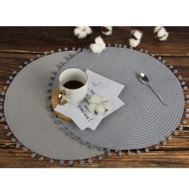 China Free Sample Design Fashion Table Place Mats Pink Round Placemats Polyester Viable Custom Handmade Woven Table Mats for sale