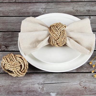 China High quality handmade natural Christmas decorative woven napkin rings viable plant plankton for wedding for sale