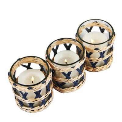 China Angustifolia Viable Custom Natural Handmade Rattan Typha Wove Paper Vellum Candle Glass Cup Holder for sale