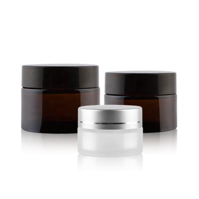 China Wholesale Personal Skin Care Packaging Frosted Amber Body Glass Cosmetic Cream Jars With Lid 5g 10g 20g 30g 50g for sale