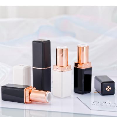 China Amazon hot sale lipstick rose cloverleaf luxury black and white plastic design tube pp gold plating empty lipstick container for sale