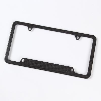 China Fixed plate factory price USA license plate frame carbon fiber car license plate number frame for sale