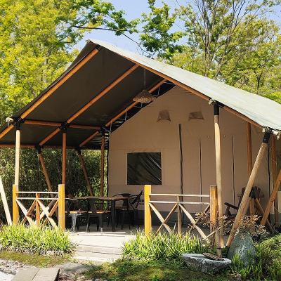 China Camouflage/Field Game Outdoor Luxury Camping 4.5*9*3.8m Glamping Bell Canvas Cabin Tent for sale