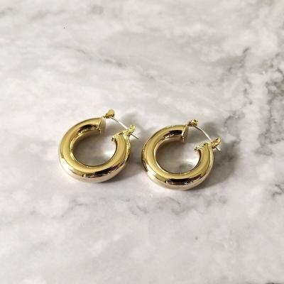 China Real Hohi Gold Plating New Cavity Small Ring Hohi Gold Plating Temperament C Shape Super Fairy Ear Studs Round Circle Earrings for sale