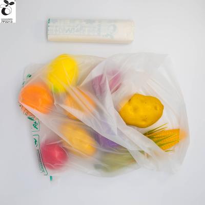 China 100% Compostable PLA Food Grade Fully Compostable Bags In Roll For Supermarket Packaging Fruit Fish Vegetable Biobased Pla Film Bags On Roll for sale