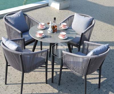 China Modern Hot Sale Outdoor Garden Wicker Table Chair Sets & Dining Furniture & Rock Slab Cloth for sale