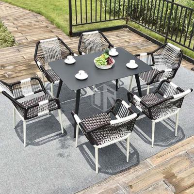 China Water Proof& UV-Resistant Design Patio Hotel Furniture Olifen Rope Aluminum Alloy Outdoor Table and Chairs Garden Terrace Dining Set for sale