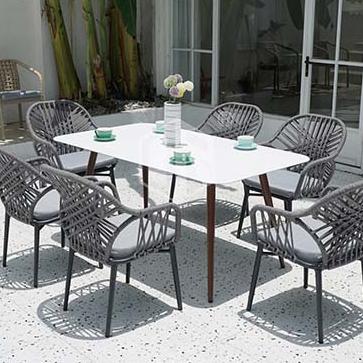 China Modern hot sale outdoor garden wicker dining furniture pe rattan tables and fabric chairsr sets for sale