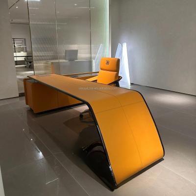 China Revolving Italian minimalist light luxury top layer leather office desk stainless steel household computer office furniture desks for sale