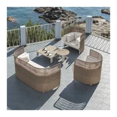 China Modern Fashion outdoor Waterproof sofa outdoor tables rattan arc-shaped outdoor table and chair set garden chairs yard hotel furniture for sale