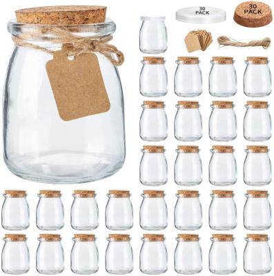 China Favor Stocked Glass Jars With Cork Lids Glass Pudding Jars Glass Containers With Lids Kitchen Storage Organizer for sale