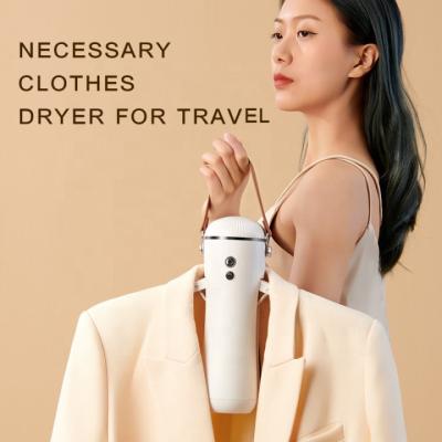 China Smart Hotel Clothing Care Machine Travel Hanger ABS Folding Clothes Dryer For Home for sale