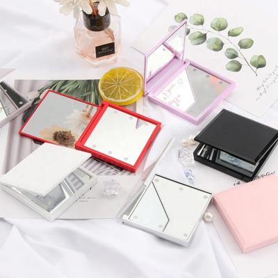 China 7cm Mini Travel Portable Plastic Personal Lighted Portable Pocket Led Makeup Mirror With Lights For Travel for sale