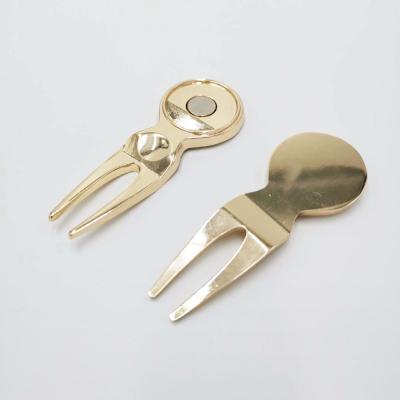 China Golf Accessory Shiny Gold Color Golf Digging Tool Bespoke Launch Fork Golf Repairl Tool With Ball Marker for sale