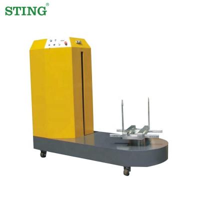 China Small Semi-automatic Food Baggage Airport Baggage Stretch Film Wrapping Machine for sale