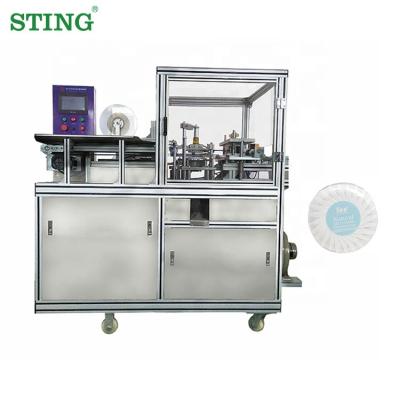 China Hotel Toiletries Chemical Fold Around Automatic Soap Wrapping Machine for sale