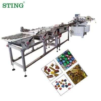 China Food Cost of Small Chocolate Bar Tablet Strip Fold Foil Wrapping Machine for sale