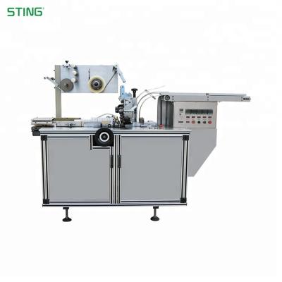 China Chemical Automatic Box Film Cellophane Wrapping Machine for sale