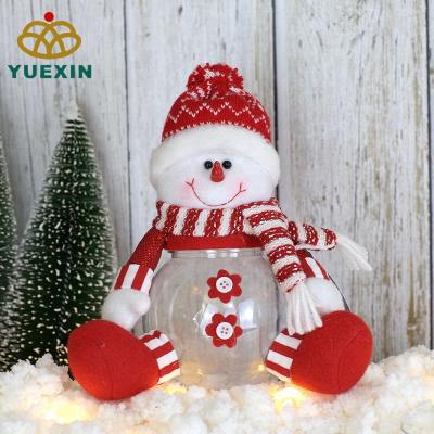 China Gift & Decoration Red And White Customize Plastic Christmas Snowman Candy Jar for sale