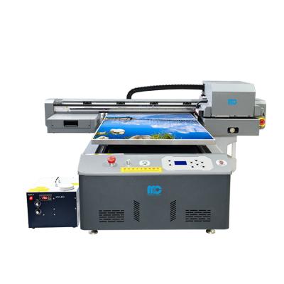 China Garment shops 3 printheads a1 flatbed inkjet printer UV6090 plotter UV6090 impressora printing shop machine for sale