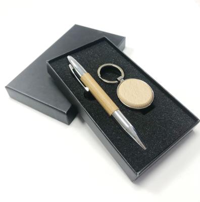 China Metal Zinc Alloy Keychain Pen Business Gift Set Wood Pen Wooden Keychains Laser Logo Luxury Corporate for sale