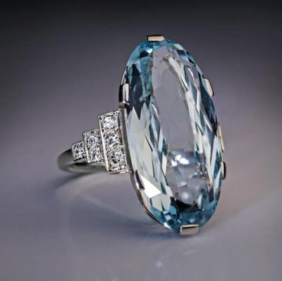 China Large Oval Crystal Shiny CZ Gemstone Romantic Sea Blue Light Blue Gemstone Silver CAOSHI Ring For Women for sale