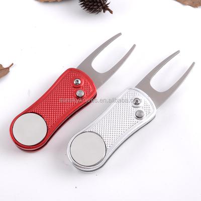 China Unique Golf Digging Tool - Stainless Switchblade with Detachable Ball Marker for sale