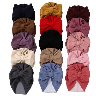 China Super Soft Multicolor Newborn Baby 0-4T Big Bow Faux Cashmere Elastic Touched Super Soft Hat Turban Hat Baby Headwear for sale