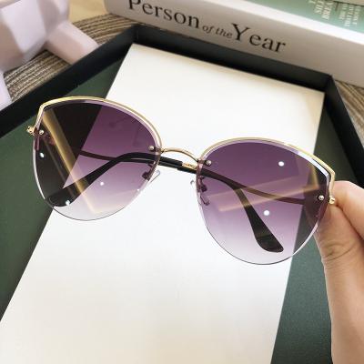 China Cat Eye Sunglasses Women Clear Gradient Sun Glasses Luxury Ocean Color Rimless Lenses New Brand Eyewear Shading Ladies Sunglass UV400 for sale