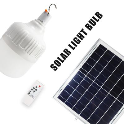 China Indoor+outdoor 40w Outdoor Portable Emergency Light Bulb Rechargeable Led Solar Energy Light Bulbs For Rooms for sale