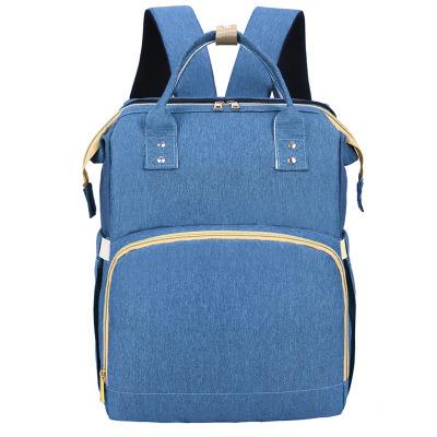 China Universal New Baby Folding Backpack Folding Baby Diaper Bag Mummy Diaper Bag Convertible Bed Universal Waterproof Wholesale Baby for sale