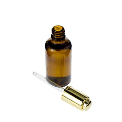 China Clear Glass Eye Brown Essential Oil Bottles With Dropper Aromatherapy Containers for sale