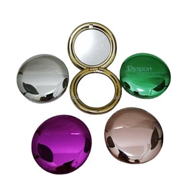 China Metal Makeup Lighted Portable Hand Mirror Round Mini Pocket Mirror Rose Gold Mirror for sale