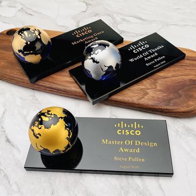 China Europe Business Gift Logo Engraved Crystal Globe Souvenir Paperweight With Base for sale