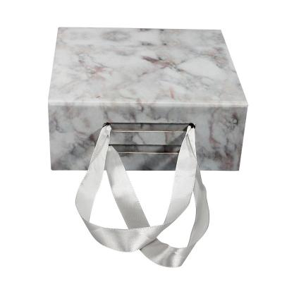 China Fashion Classic Ribbon Handle Gift Paper Folding Box Magnet Box Marbling Packaging for sale