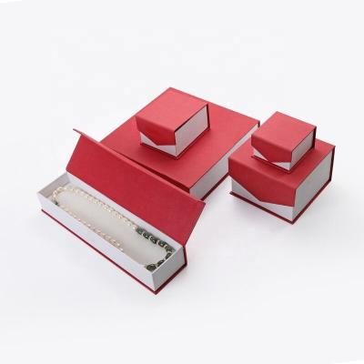 China Classic Wholesale Custom Cheap Red Flip Paper Box Magnet Packaging Jewelry Box for sale