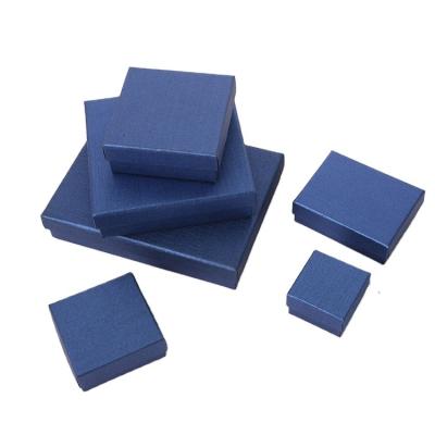 China Classic Customize Cheap Blue Kraft Paper Box Velvet Insert Jewelry Box Packaging for sale