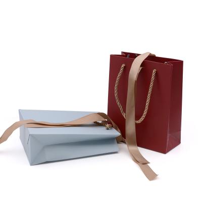 China Classic Luxury Custom Personalized Kraft Paper Bags With Handle Jewelry Gift Shopping Paper Bag for sale