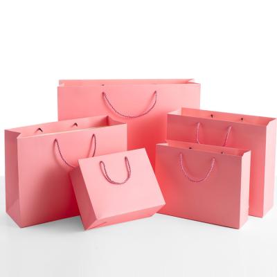 China Recycled Materials Customize Pink Kraft Paper Shopping Bag Printing Kraft Paper Bag Packing For Gift for sale