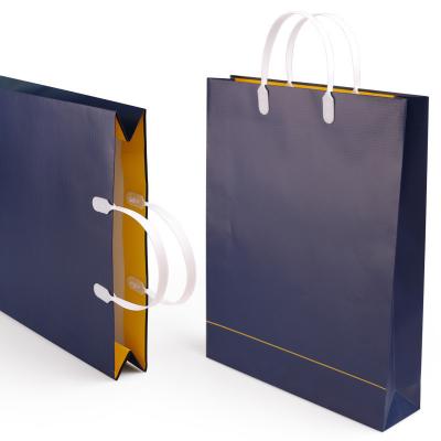 China Classic Custom Logo Paper Bag Kraft Paper Bag Cheap Shopping Packaging for sale