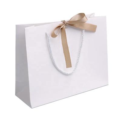 China Wholesale OEM Gift Custom Logo Custom Logo White Paper Bag Customized Paper Bags for sale