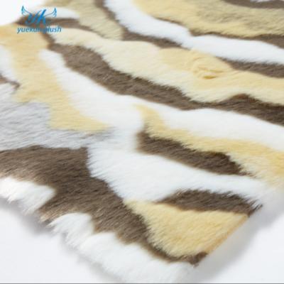 China Auto Colored Luxury Acrylic Fabric 100 Colored Luxury Fabric Manufacturers Faux Fur Fleece Garment Fleece Fashion Upholstery Animal Fur for sale