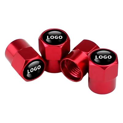 China AL Custom Flag Mini Logo Car Tire Valve Covers for sale