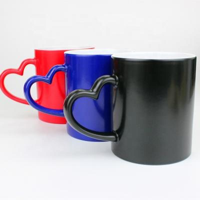 China Wholesale Sublimation Viable Changeable Matte Red Blue Black Color Handle Heart 11oz Ceramic Mug for sale