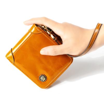 China Waterproof Antimagnetic RFID Women Leather Wallet Zipper Fashion Casual Wallet Zipper Ladies Whip Short Purse for sale