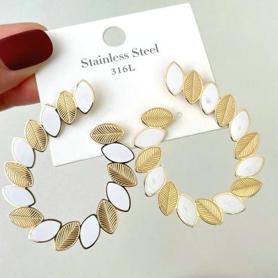 China 2022 New Arrival TRENDY White Stainless Steel Leaf Stud Earrings for sale